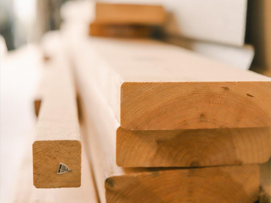 Dimensional lumber stacked in the yard